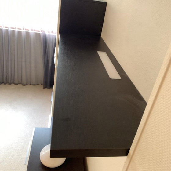 Image 1 of Sleek wall unit with hanging element ALPE