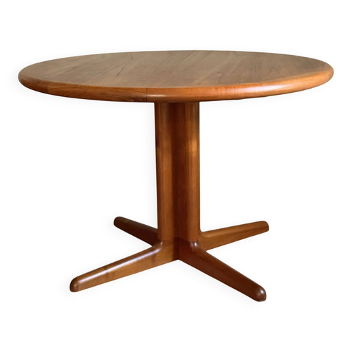 Vintage round Scandinavian teak table with a central star base, extendable.