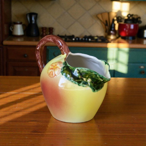 Large vintage apple-colored earthenware carafe