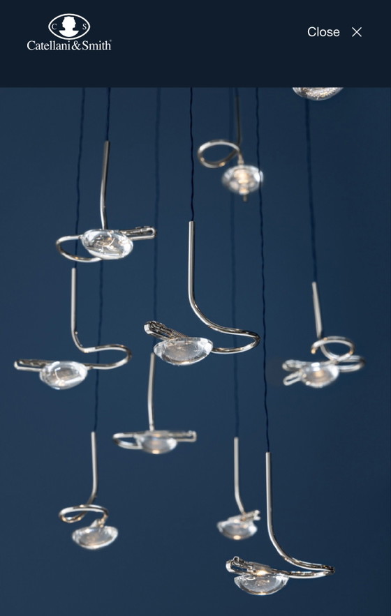 Image 1 of Le lustre Jackie O 20 de Catellani & Smith est un chef-d'œuvre d'éclairage.