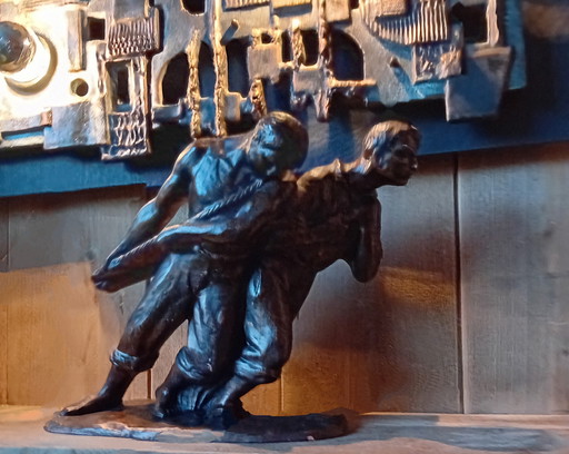 Statue en terre cuite. JC Guero, Art déco en teinte bronze