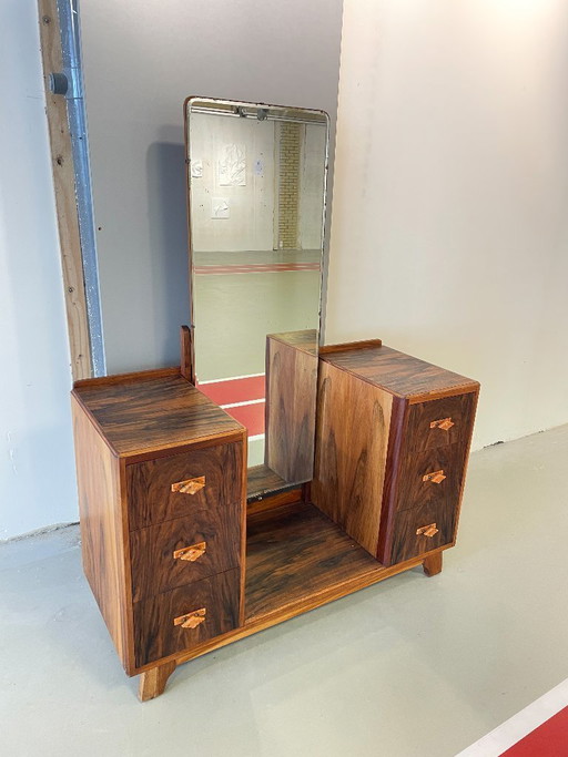 Toeletta Art Déco realizzata in impiallacciatura di palissandro con specchio originale smussato.