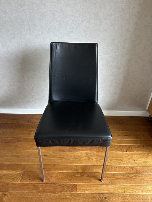 4 Black leather dining chairs