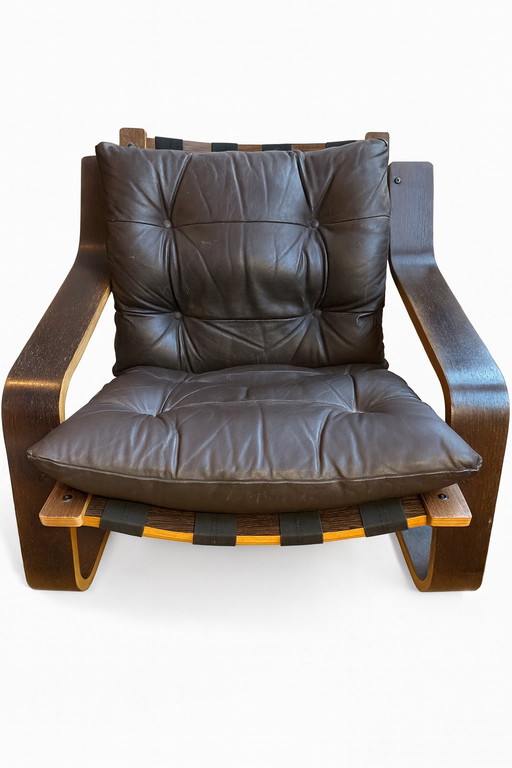 Multiplex & leer feauteuil naar scandinavisch design