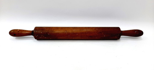 Rodillo de madera primitivo antiguo