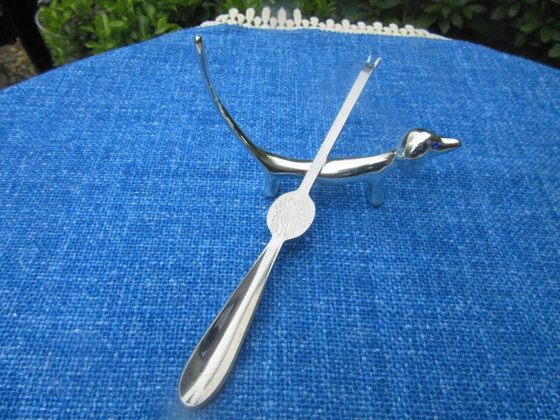 Image 1 of 4 Silver Plated Knife Rests Dachshund Dog Long Tail Blue Eyes vintage