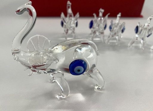 Famiglia di elefanti dagli occhi azzurri in confezione regalo