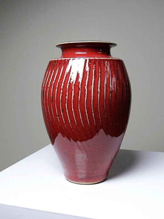 Image 1 of Oxblood-blood glazed stoneware vase with ribs, 20th-century workshop piece