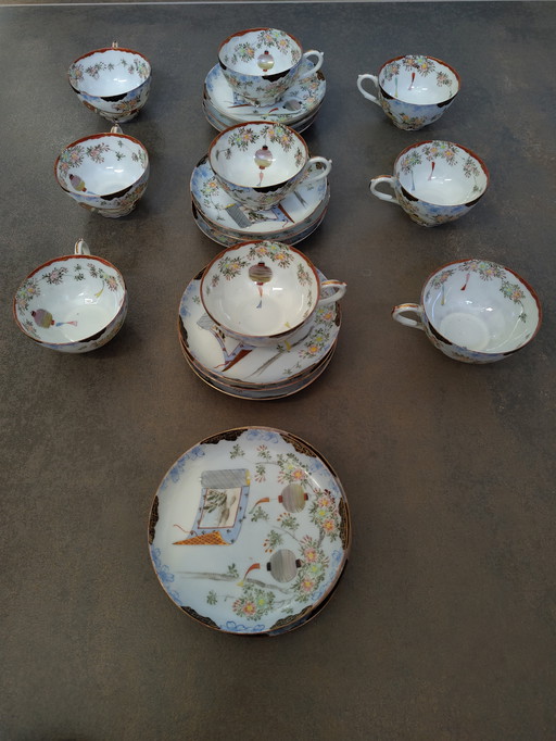 9 Chinese hand-painted tea cups and 12 matching saucers