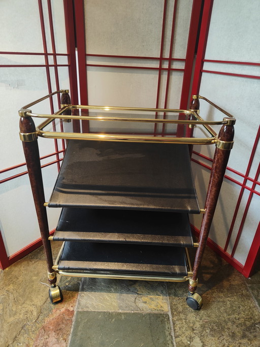 Revistero de mesa auxiliar vintage de latón