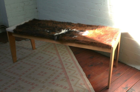 Image 1 of Strak Cow hide bank/ bijzettafel