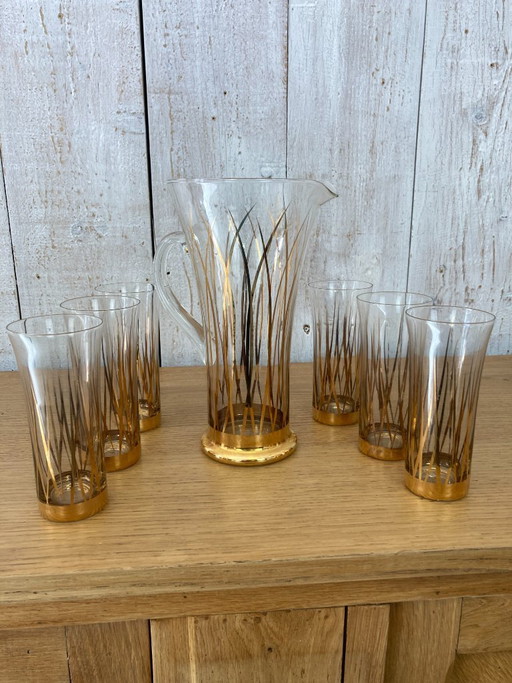 Juego de 6 vasos con jarra a juego.