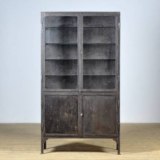 Polished iron medical cabinet, 1930s