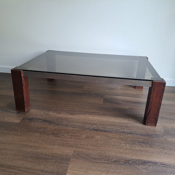 Image 1 of Robusto tavolino vintage con vetro fumé