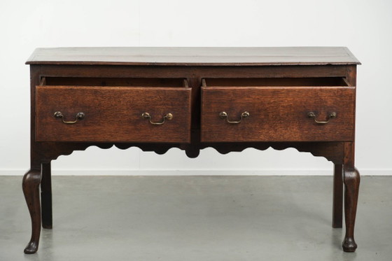 Image 1 of Beautifully sized antique 18th-century English oak dresser/sideboard with brass handles and beautiful colors.