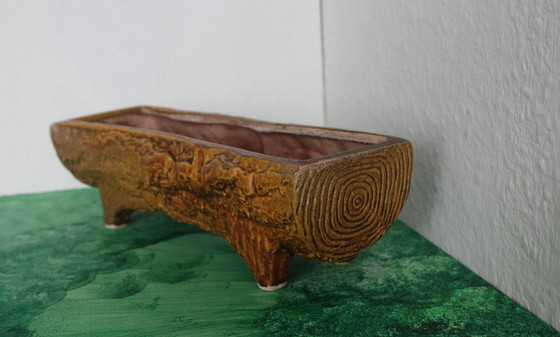 Image 1 of Jardinière vintage en forme de tronc d'arbre, en céramique de la manufacture Vetter.