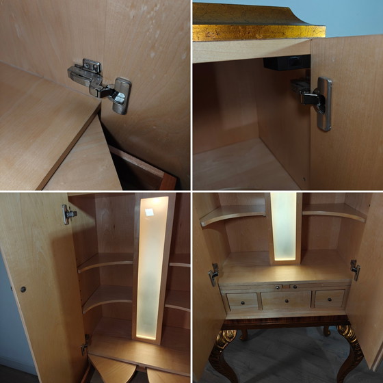 Image 1 of Elegante mueble bar estilo smoking con iluminación de Jansen Furniture: palisandro y arce, pan de oro