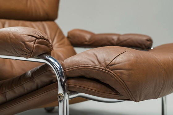 Image 1 of  Conjunto de tumbona y otomana suecas en cromo y cuero marrón de Scapa Rydaholm, años 60