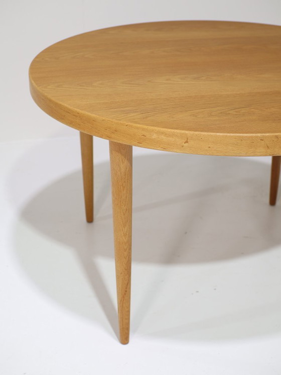 Image 1 of Extendable round dining table oak Danish