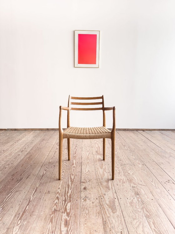 Image 1 of Esszimmerstuhl mit Armlehnen aus Eichenholz, Modell 62 für J.L. Moller