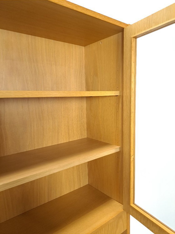 Image 1 of Tall LP display case with glass doors and reading shelf from Sweden