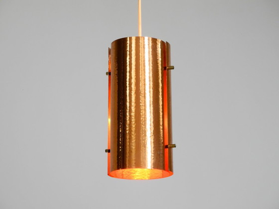 Image 1 of Two rare mid-century tube pendant lamps consisting of two screwed-together copper bowls