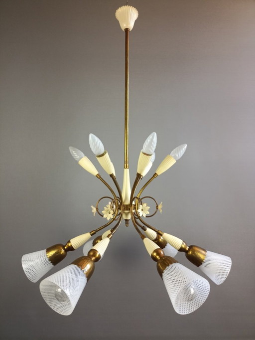 Chandelier twelve-light with Murano glass "Reticello" lampshades. Gilt brass and aluminum frame. Italy, 1950s.