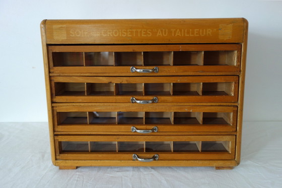 Image 1 of 4-drawer vintage silk haberdashery display cabinet on shelf