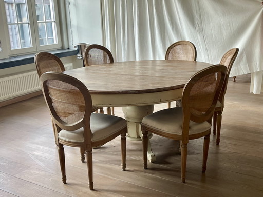 Uitschuifbare eiken kloostertafel met 6 stoelen