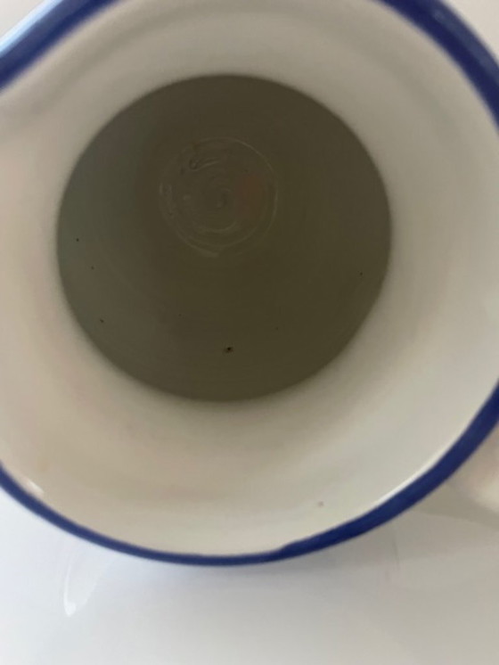 Image 1 of Handgemaakte vintage schenkkan met kleurrijke strepen