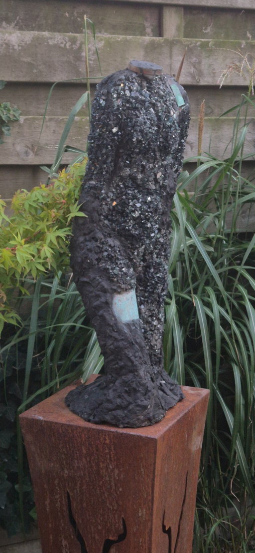 Shattered - sculpture of glass, cement and copper