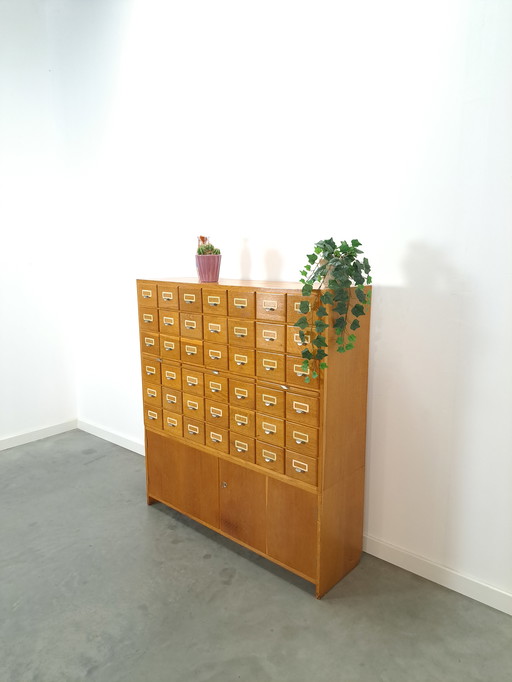 Old wooden chest of drawers with extendable shelves vintage