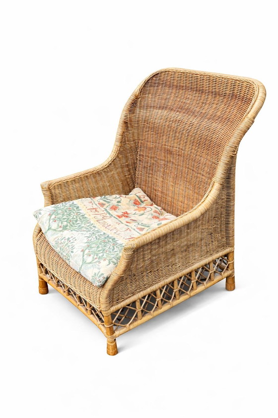 Image 1 of Søren Lund Møbler : Fauteuil en rotin Karen Blixen avec pouf assorti