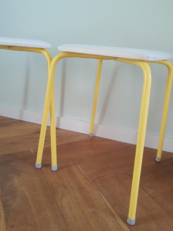 Image 1 of Set of 2 50s-60s tubular frame faux leather stools in white and yellow