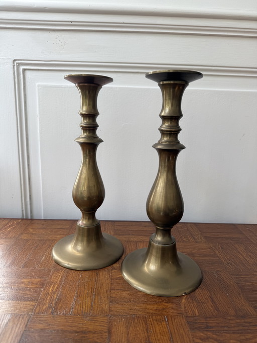 2 large brass candle holders