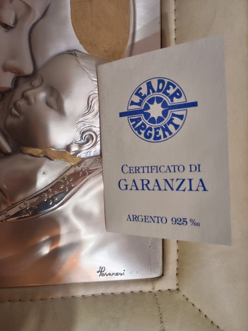 L. Pesaresi (Leader Argenti) – Madonna col Bambino – Argento 925 e Pelle