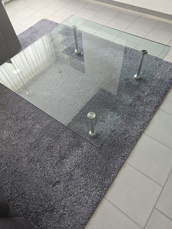 Image 1 of Design glass table with stainless steel legs; square model