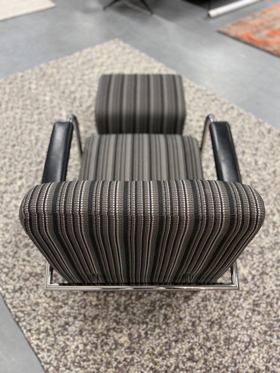 Image 1 of Leolux Scylla high armchair with Belluno fabric pouf in gray leather