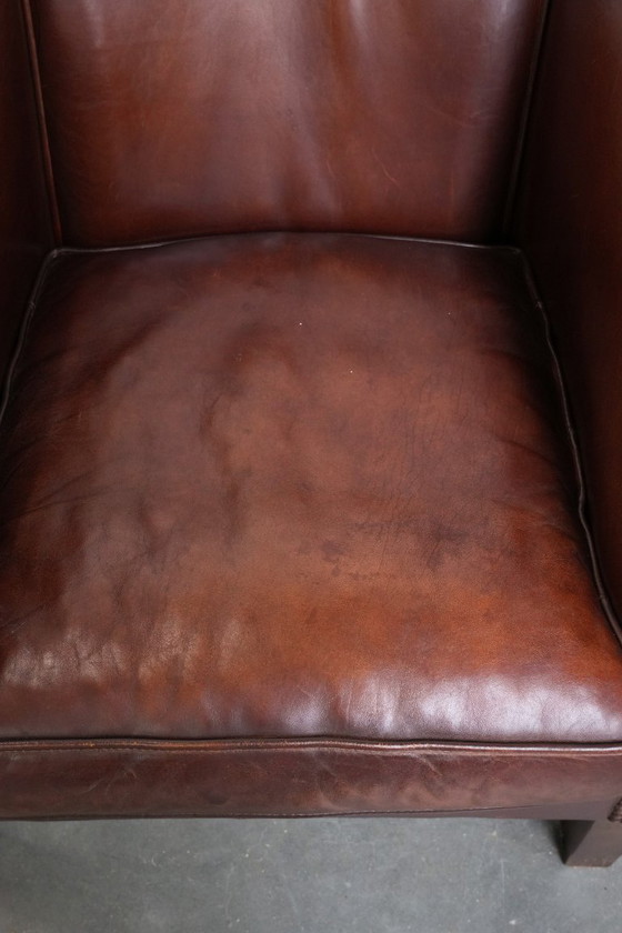 Image 1 of Vintage schapenleren clubfauteuil met siernagels