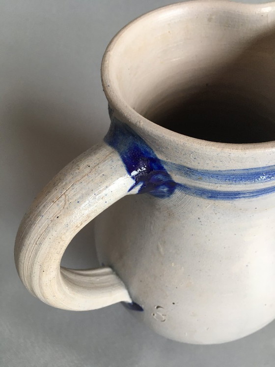 Image 1 of Grand pichet à eau de Cologne ancien en grès salé