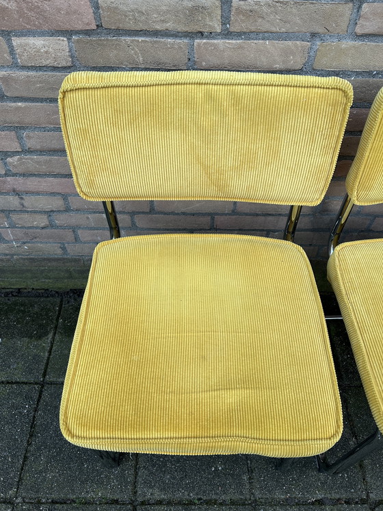 Image 1 of 6 sedie in tessuto a coste gialle con struttura tubolare cromata