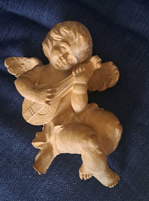 Hand-carved wooden Cherub
