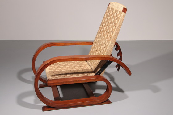Image 1 of Een uitzonderlijk zeldzame mahoniehouten fauteuil gemaakt in Italië in de jaren 1950