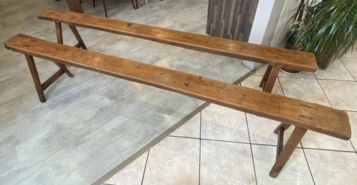 Twee massief eikenhouten boerenbanken van 214 cm voor een rustieke boerentafel uit de jaren 50.