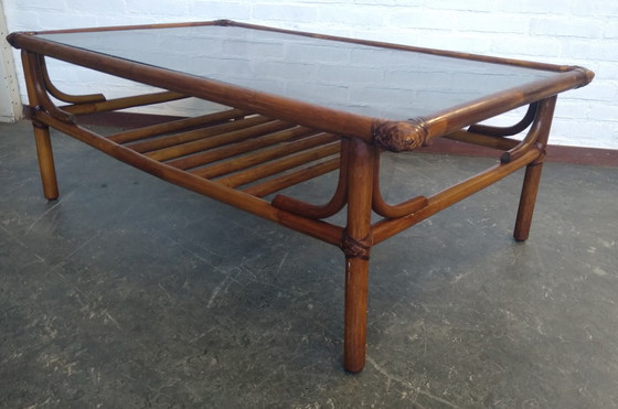 Image 1 of Table basse Rohé en verre fumé et reliure en cuir