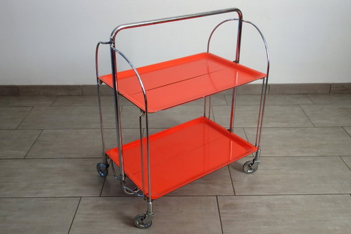 Orange folding serving cart, Bremshey, 1970