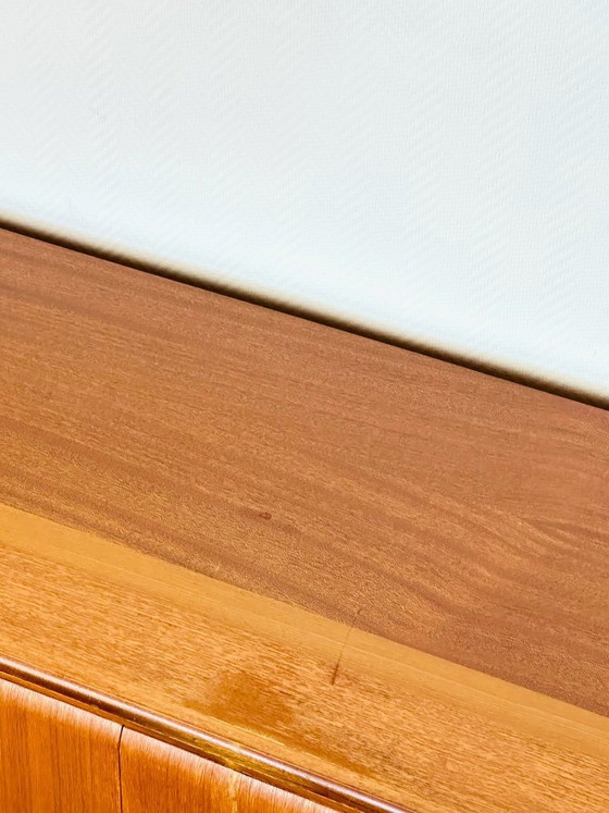 Image 1 of Aparador bajo escandinavo de teca con 3 cajones y patas inclinadas, 1960.