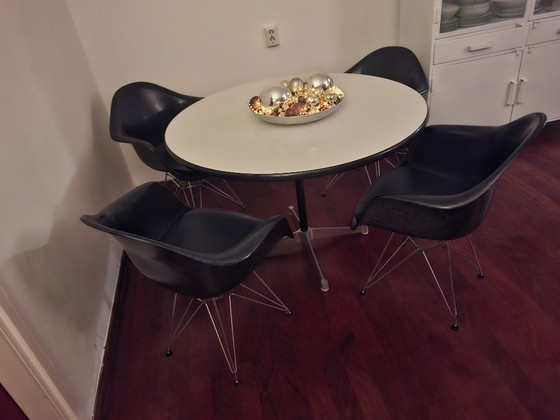 Image 1 of iconic Charles & Ray Eames, Herman Miller, authentic Fiberglass dark blue Shell Chairs, with "Eiffel" base