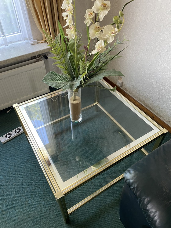 Image 1 of Couchtisch aus Glas mit goldenen Details
