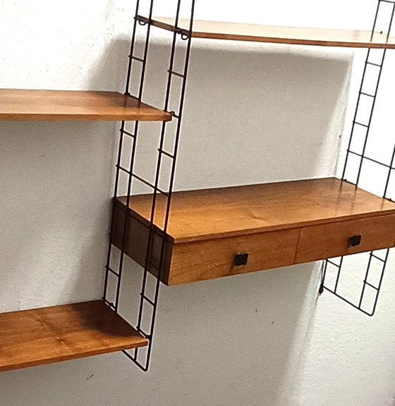 Image 1 of groot vijftiger jaren wandrek met lades en schappen 